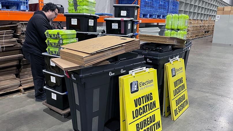 Voting location supply packing underway at the election warehouse.