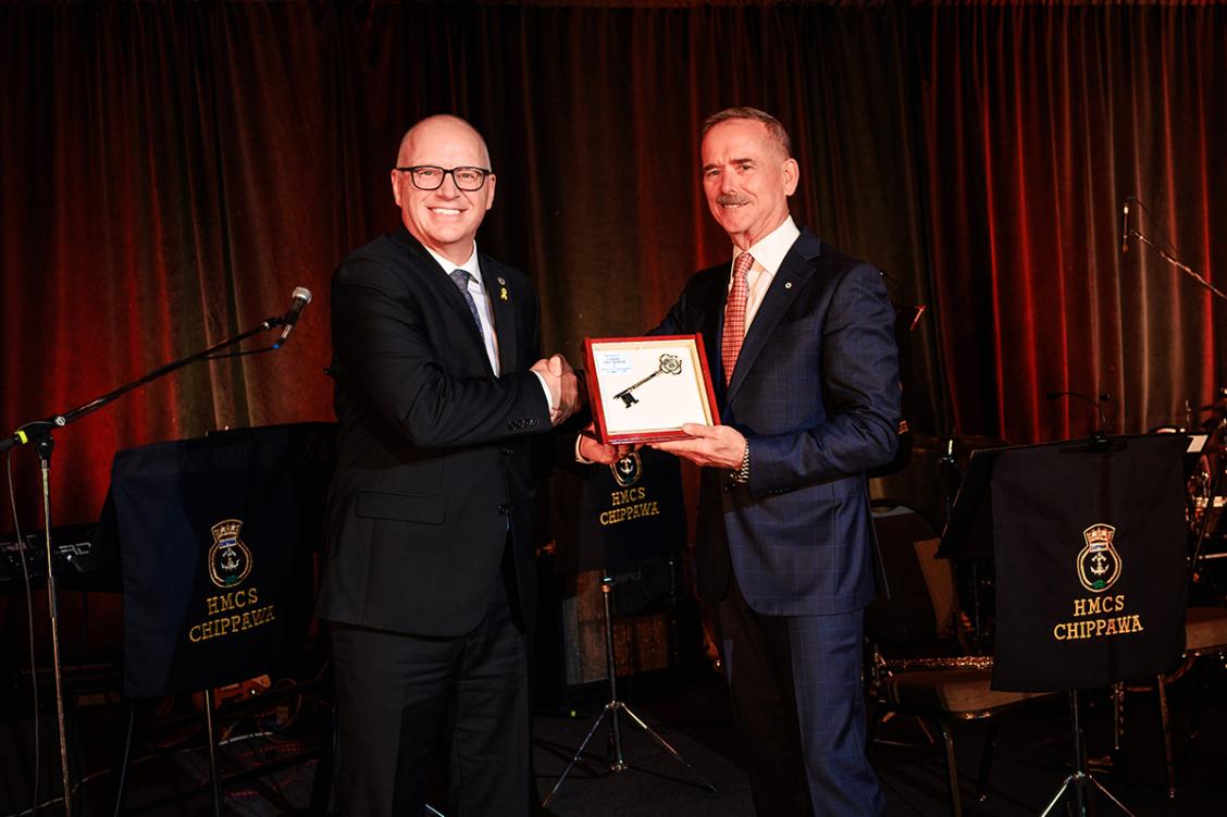 Mayor Scott Gillingham presenting the Key to the City to Colonel Chris Hadfield