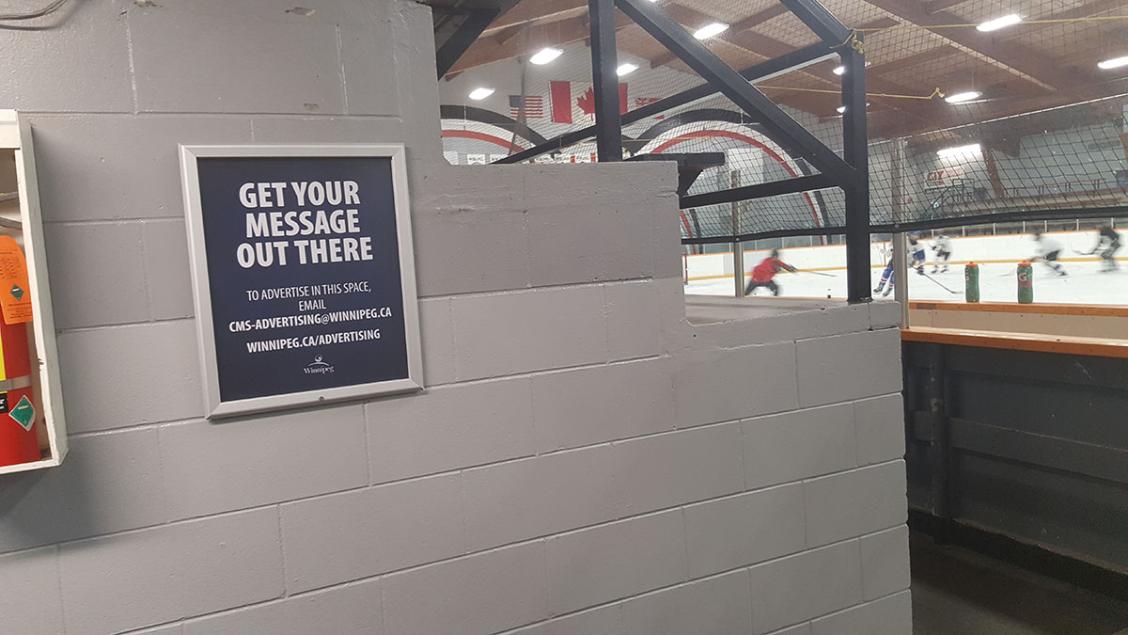 Poster board at Eric Coy Arena