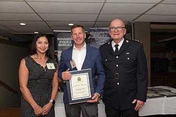 Michael Keweriga with Acting Chief Art Stannard