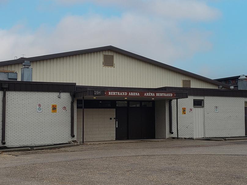 Brown doors that mark the exterior entrance of the Bertrand Arena.