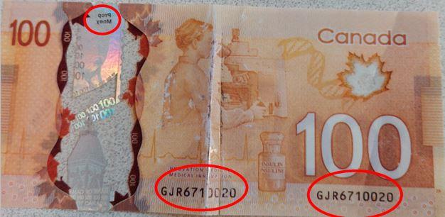 Counterfeit 100 dollar bill