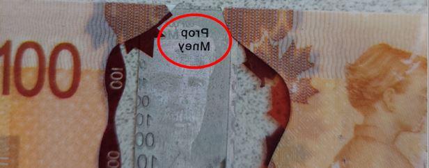 Counterfeit 100 dollar bill