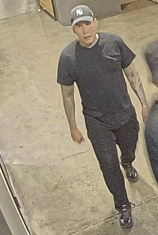 Suspect Wearing black clothing 