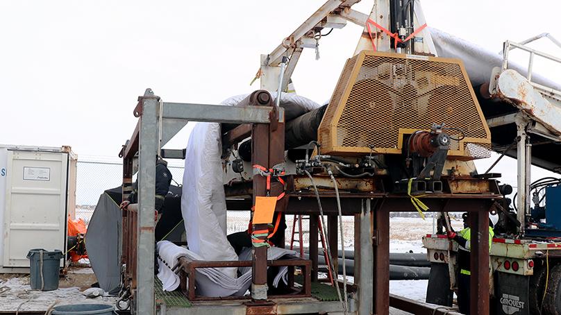 The resin filled lining entering into an access shaft.
